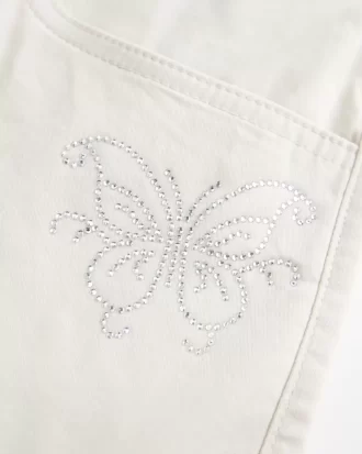 Alçak Bel Parlak Kelebek Desenli Mini Etek