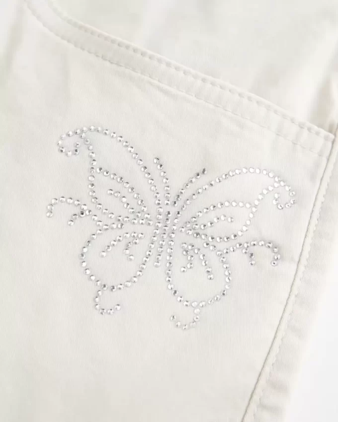 Alçak Bel Parlak Kelebek Desenli Mini Etek