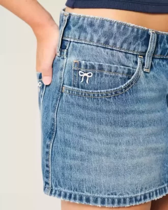 Düşük Bel İşlemeli Fiyonklu Kot Mini Etek