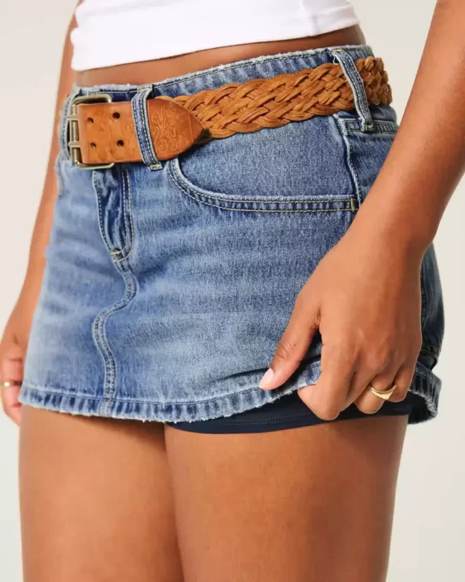 Kıvrımlı Düşük Bel İşlemeli Fiyonklu Kot Mini Etek