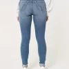 Kıvrımlı Yüksek Bel Yırtık Orta Yıkama Süper Dar Kot Pantolon